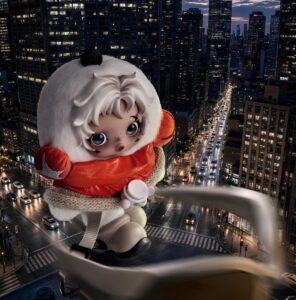 SKULLPANDA Sunlight Wanderer Plush Doll Pendant in an orange puffer jacket above a city street